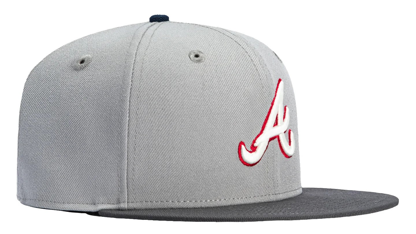 Gray fitted baseball cap with red outlined “A” logo and flat brim, side profile view.